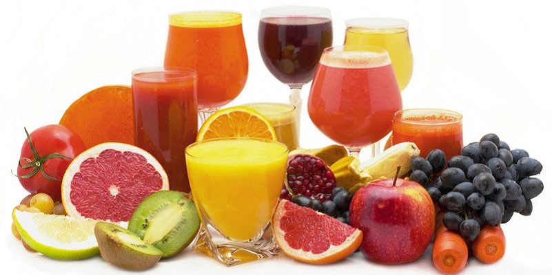 Five glasses of fresh juice from different fruit