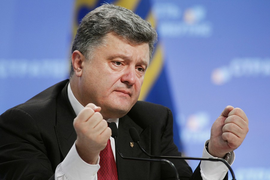 Ukraine's President Petro Poroshenko speaks to the media during a news conference in Kiev, September 25, 2014. Ukraine and the rest of the world will not recognize local elections planned by pro-Russian separatists next month, Poroshenko said on Thursday, adding that he hoped Russia would follow the same course. REUTERS/Valentyn Ogirenko (UKRAINE - Tags: POLITICS)
